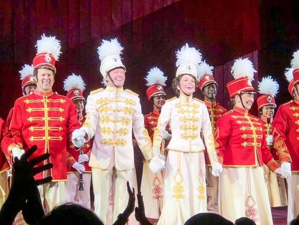 A group of people wearing clothing Description automatically generated with medium confidence